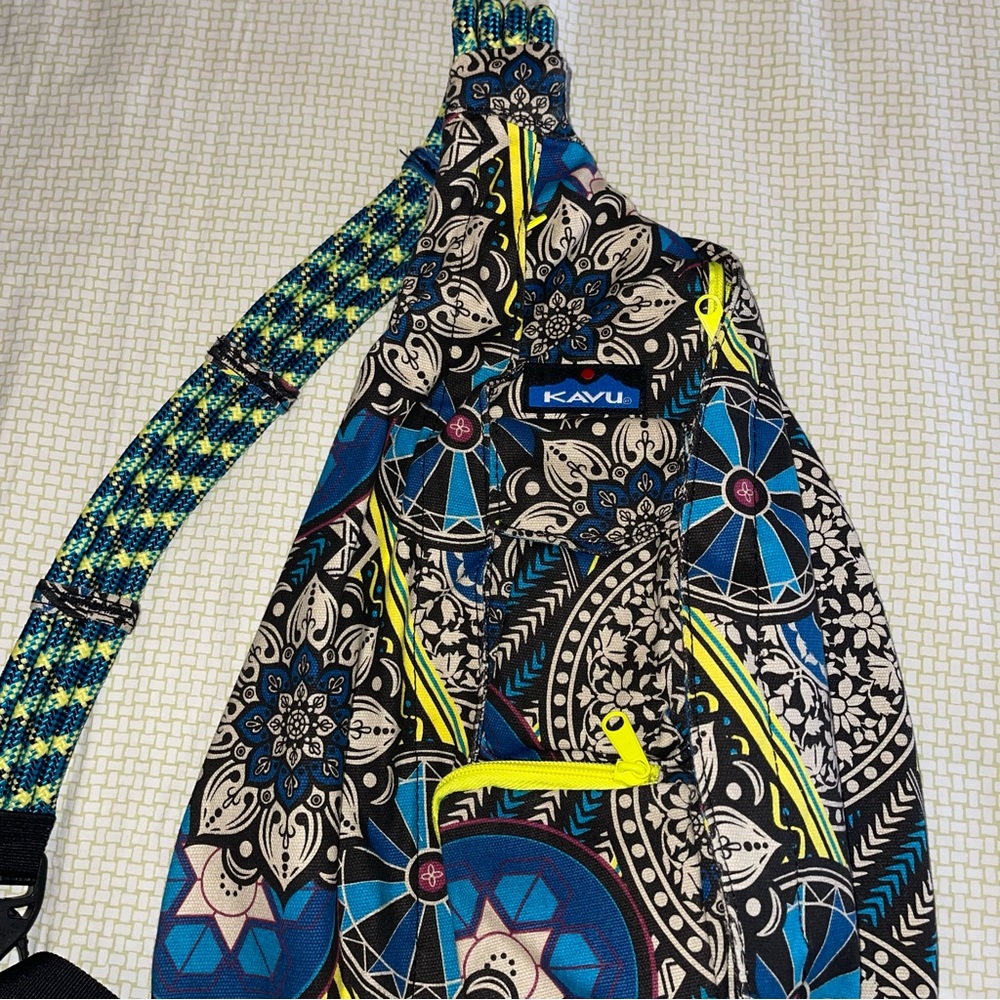 KAVU rope sling bag floral green blue backpack